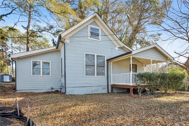 Welcome home to this bright and inviting 3-bedroom, 2-bath home on John A. White Golf Course in Georgia - for sale on GolfHomes.com, golf home, golf lot
