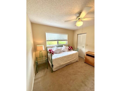 Come see this beautiful first floor end unit in charming on The Little Club in Florida - for sale on GolfHomes.com, golf home, golf lot