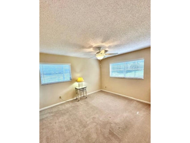 Come see this beautiful first floor end unit in charming on The Little Club in Florida - for sale on GolfHomes.com, golf home, golf lot