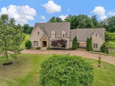 Welcome to this stunning home in a sought-after golf course on Covington Country Club in Tennessee - for sale on GolfHomes.com, golf home, golf lot