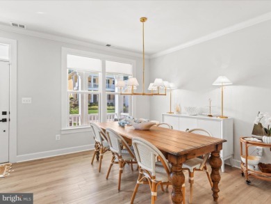 Welcome to 22179 Dune Circle, a stunning end-unit townhome in on The Peninsula Golf and Country Club in Delaware - for sale on GolfHomes.com, golf home, golf lot