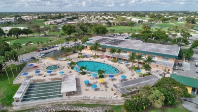 ALL IMPACT GLASS, 1ST FLOOR GARDEN VIEW CONDO FOR UNDER 100K!!! on Kings Point Golf -Flanders Way in Florida - for sale on GolfHomes.com, golf home, golf lot