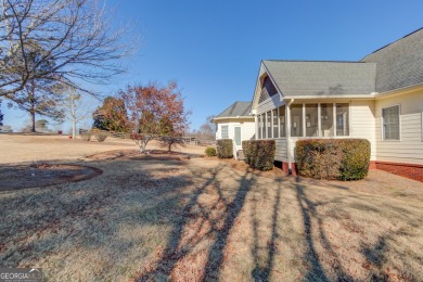 Welcome to 6781 Highland Pointe Pl., a stunning 3-bedroom on The Providence Club in Georgia - for sale on GolfHomes.com, golf home, golf lot