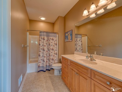 Enter your own private resort! This estate is nestled on a very on Carrington Golf Club in Michigan - for sale on GolfHomes.com, golf home, golf lot