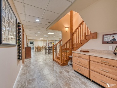 Enter your own private resort! This estate is nestled on a very on Carrington Golf Club in Michigan - for sale on GolfHomes.com, golf home, golf lot