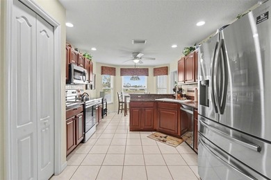 Welcome to 10926 Collar Drive, a beautifully maintained on Tampa Bay Golf and Country Club in Florida - for sale on GolfHomes.com, golf home, golf lot