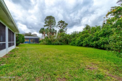 Inviting Home in the Desirable Golf Community of Turnbull on Turnbull Bay Golf Club in Florida - for sale on GolfHomes.com, golf home, golf lot