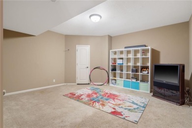 Perfectly situated on a premier golf course lot, this reverse 1 on Staley Farms Golf Club in Missouri - for sale on GolfHomes.com, golf home, golf lot