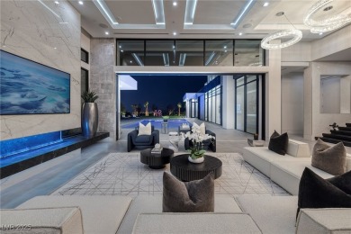 The Taylor Estate's elevated location is set btwn striking on The Summit Club in Nevada - for sale on GolfHomes.com, golf home, golf lot