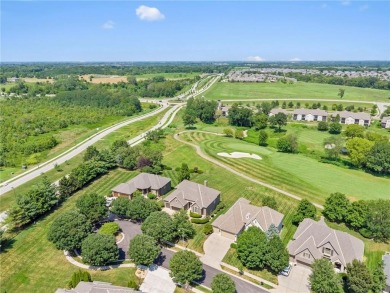 Perfectly situated on a premier golf course lot, this reverse 1 on Staley Farms Golf Club in Missouri - for sale on GolfHomes.com, golf home, golf lot