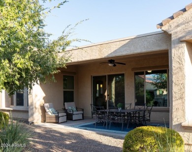 Step into style and comfort through a private courtyard w/a on Copper Canyon Golf Club in Arizona - for sale on GolfHomes.com, golf home, golf lot