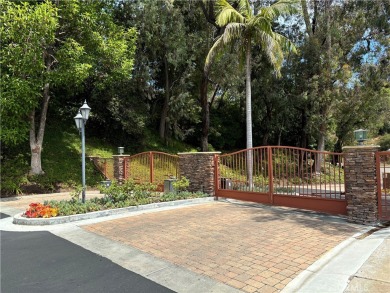 Surrounded by the endless lush landscape, this hard-to-find on Anaheim Hills Golf Course in California - for sale on GolfHomes.com, golf home, golf lot