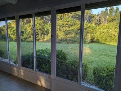 Under contract-accepting backup offers. Modern Comfort with on Falcon Watch Golf Club in Florida - for sale on GolfHomes.com, golf home, golf lot