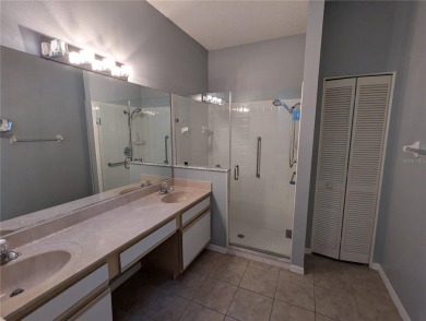 Under contract-accepting backup offers. Modern Comfort with on Falcon Watch Golf Club in Florida - for sale on GolfHomes.com, golf home, golf lot