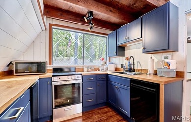 Escape to your own secluded wooded retreat! This completely on Innsbrook Resort Golf Course in Missouri - for sale on GolfHomes.com, golf home, golf lot