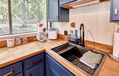 Escape to your own secluded wooded retreat! This completely on Innsbrook Resort Golf Course in Missouri - for sale on GolfHomes.com, golf home, golf lot