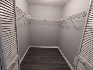 Under contract-accepting backup offers. Modern Comfort with on Falcon Watch Golf Club in Florida - for sale on GolfHomes.com, golf home, golf lot