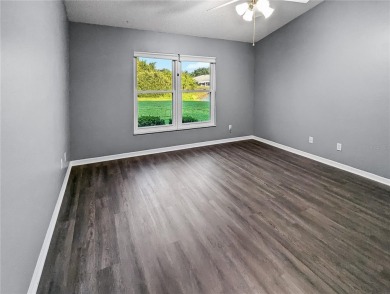 Under contract-accepting backup offers. Modern Comfort with on Falcon Watch Golf Club in Florida - for sale on GolfHomes.com, golf home, golf lot