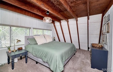 Escape to your own secluded wooded retreat! This completely on Innsbrook Resort Golf Course in Missouri - for sale on GolfHomes.com, golf home, golf lot