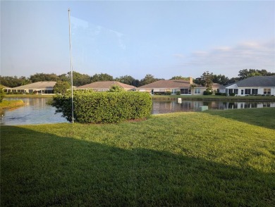 Under contract-accepting backup offers. Modern Comfort with on Falcon Watch Golf Club in Florida - for sale on GolfHomes.com, golf home, golf lot