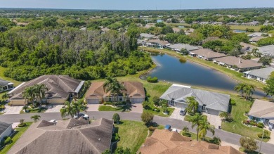 Under contract-accepting backup offers. Modern Comfort with on Falcon Watch Golf Club in Florida - for sale on GolfHomes.com, golf home, golf lot