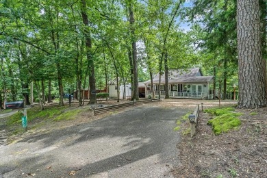Immaculate and impeccably maintained home on a lovely wooded lot on Holly Lake Ranch Golf Club in Texas - for sale on GolfHomes.com, golf home, golf lot