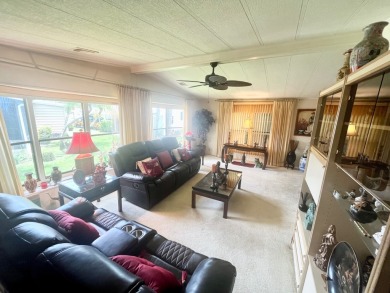 If you're looking for a large 2-bedroom, 2-bath home with a on Lake Fairways Country Club in Florida - for sale on GolfHomes.com, golf home, golf lot