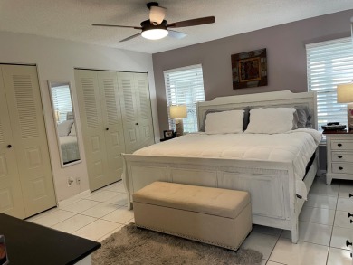 Beautiful updated Bermuda model villa  2 bedroom + den area on Cypress Lakes Golf Course - West Palm Beach in Florida - for sale on GolfHomes.com, golf home, golf lot