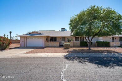 This charming Gemini twin home at 10229 N 108th Ave offers on Sun City Lakes West and East in Arizona - for sale on GolfHomes.com, golf home, golf lot