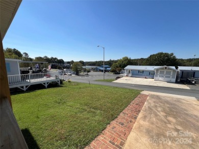 No need to wait for summer to start Lake Life! Badin Shores on Old North State Club at Uwharrie Point Golf community in North Carolina - for sale on GolfHomes.com, golf home, golf lot