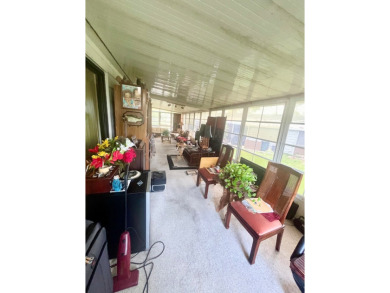 If you're looking for a large 2-bedroom, 2-bath home with a on Lake Fairways Country Club in Florida - for sale on GolfHomes.com, golf home, golf lot