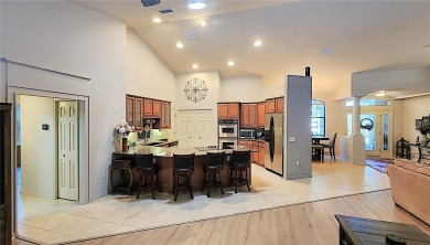 Experience Refined Living in Grand Park Village, Situated within on Rainbow Springs Golf and Country Club in Florida - for sale on GolfHomes.com, golf home, golf lot