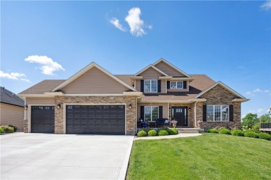 Discover this stunning 1.5-story home with seamless backyard on Hyperion Field Club in Iowa - for sale on GolfHomes.com, golf home, golf lot