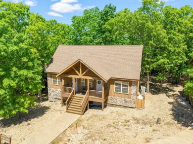 Escape to this charming 1-bedroom cabin/half-duplex nestled in on Ledgestone Country Club and Golf Course in Missouri - for sale on GolfHomes.com, golf home, golf lot