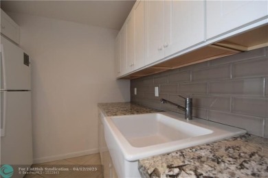 PENTHOUSE APT. GORGEOUS WATER AND GOLF VIEWS. 1 BEDROOM 1 1/2 on Wynmoor Golf Course in Florida - for sale on GolfHomes.com, golf home, golf lot
