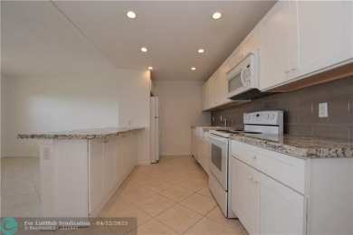 PENTHOUSE APT. GORGEOUS WATER AND GOLF VIEWS. 1 BEDROOM 1 1/2 on Wynmoor Golf Course in Florida - for sale on GolfHomes.com, golf home, golf lot
