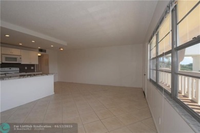 PENTHOUSE APT. GORGEOUS WATER AND GOLF VIEWS. 1 BEDROOM 1 1/2 on Wynmoor Golf Course in Florida - for sale on GolfHomes.com, golf home, golf lot