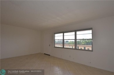 PENTHOUSE APT. GORGEOUS WATER AND GOLF VIEWS. 1 BEDROOM 1 1/2 on Wynmoor Golf Course in Florida - for sale on GolfHomes.com, golf home, golf lot