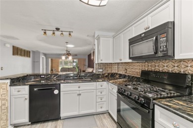Paradise found!  Adorable and well maintained villa in Arlington on Arlington Ridge Golf Club in Florida - for sale on GolfHomes.com, golf home, golf lot
