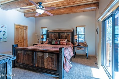 Oversized logs and beautifully designed landscaping create the on Torreon Golf Club in Arizona - for sale on GolfHomes.com, golf home, golf lot