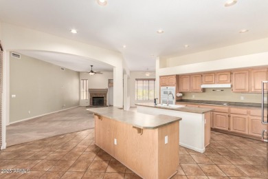 This beautiful four-bedroom, three-bathroom home is located in a on The Legend at Arrowhead in Arizona - for sale on GolfHomes.com, golf home, golf lot