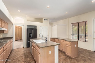 This beautiful four-bedroom, three-bathroom home is located in a on The Legend at Arrowhead in Arizona - for sale on GolfHomes.com, golf home, golf lot