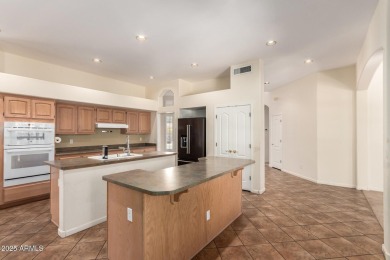 This beautiful four-bedroom, three-bathroom home is located in a on The Legend at Arrowhead in Arizona - for sale on GolfHomes.com, golf home, golf lot