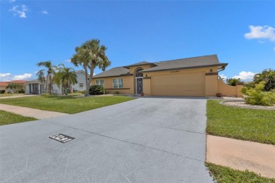 Enjoy a beautiful water view right from your front door with on Duffys Golf Center in Florida - for sale on GolfHomes.com, golf home, golf lot