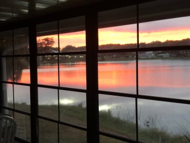 Come and ENJOY a Comfortable Serene Lifestyle ON THE WATER in a on Water Oak Country Club Estates in Florida - for sale on GolfHomes.com, golf home, golf lot