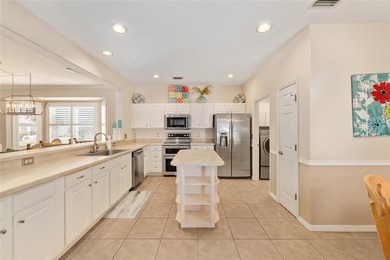 This bright and spacious Captiva model is now available in on Eagle Ridge At Spruce Creek Country Club in Florida - for sale on GolfHomes.com, golf home, golf lot