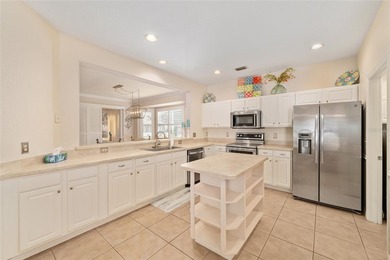 This bright and spacious Captiva model is now available in on Eagle Ridge At Spruce Creek Country Club in Florida - for sale on GolfHomes.com, golf home, golf lot