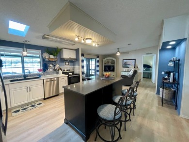 Come and ENJOY a Comfortable Serene Lifestyle ON THE WATER in a on Water Oak Country Club Estates in Florida - for sale on GolfHomes.com, golf home, golf lot