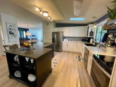 Come and ENJOY a Comfortable Serene Lifestyle ON THE WATER in a on Water Oak Country Club Estates in Florida - for sale on GolfHomes.com, golf home, golf lot