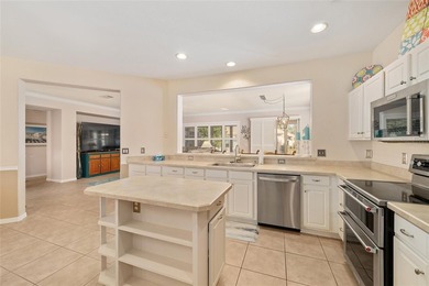 This bright and spacious Captiva model is now available in on Eagle Ridge At Spruce Creek Country Club in Florida - for sale on GolfHomes.com, golf home, golf lot